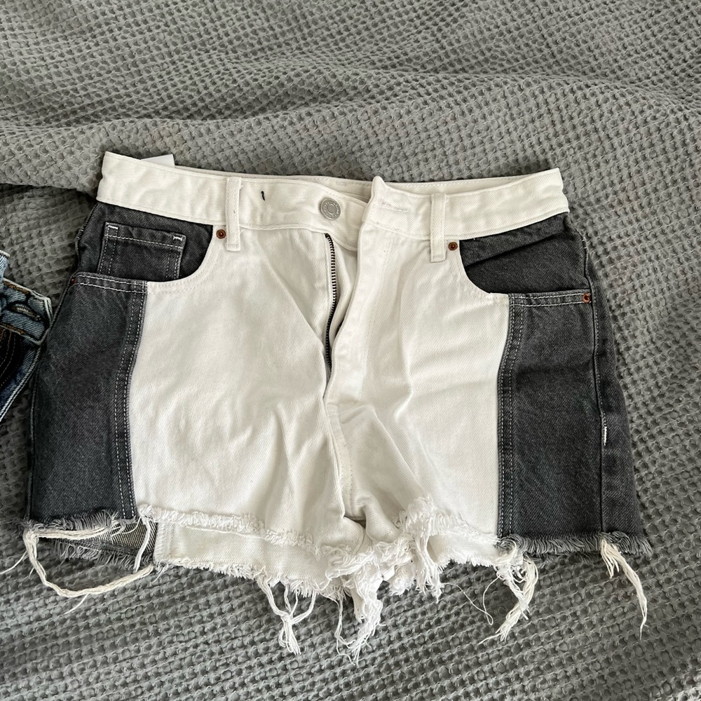 White and washed black denim shorts with panels